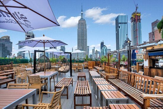 An upscale rooftop summer party venue in Midtown: 230 Fifth Rooftop Bar1
