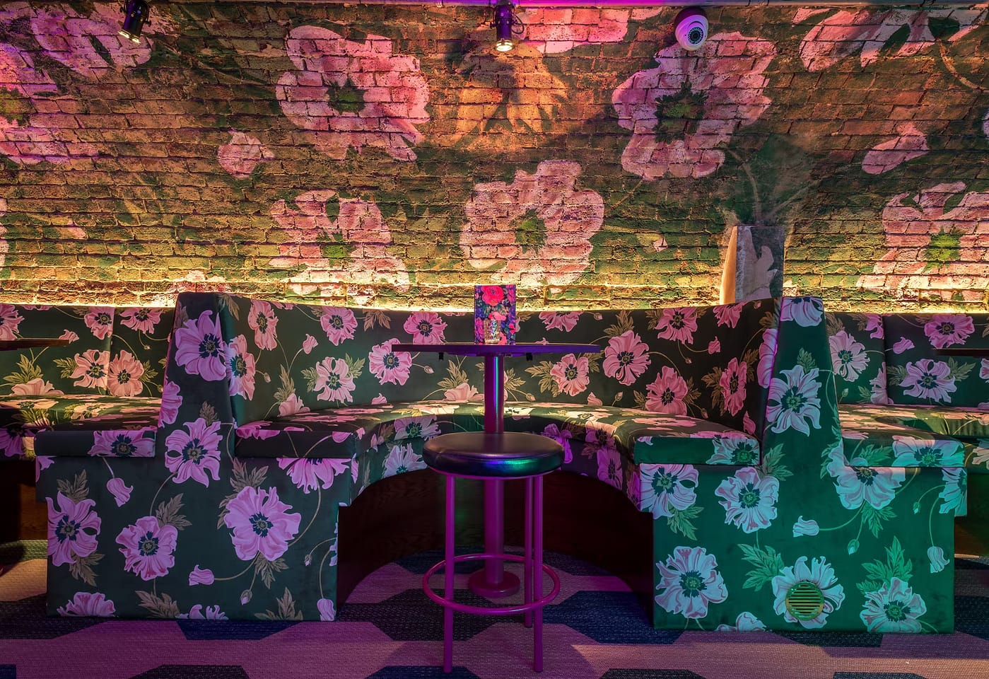 Enjoy a cocktail in Covent Garden at Blame Gloria. Photograph of floral decor.