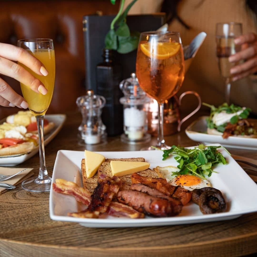 A quirky blue-tiled bar and moody lighting: Bonds Mayfair image 3