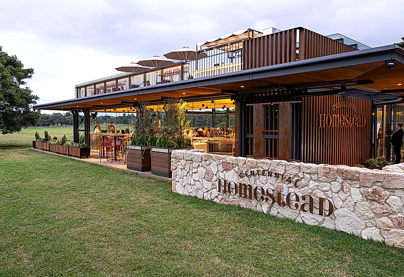 The Paddock with lawn and Treehouse rooftop bar, Centennial Homestead1