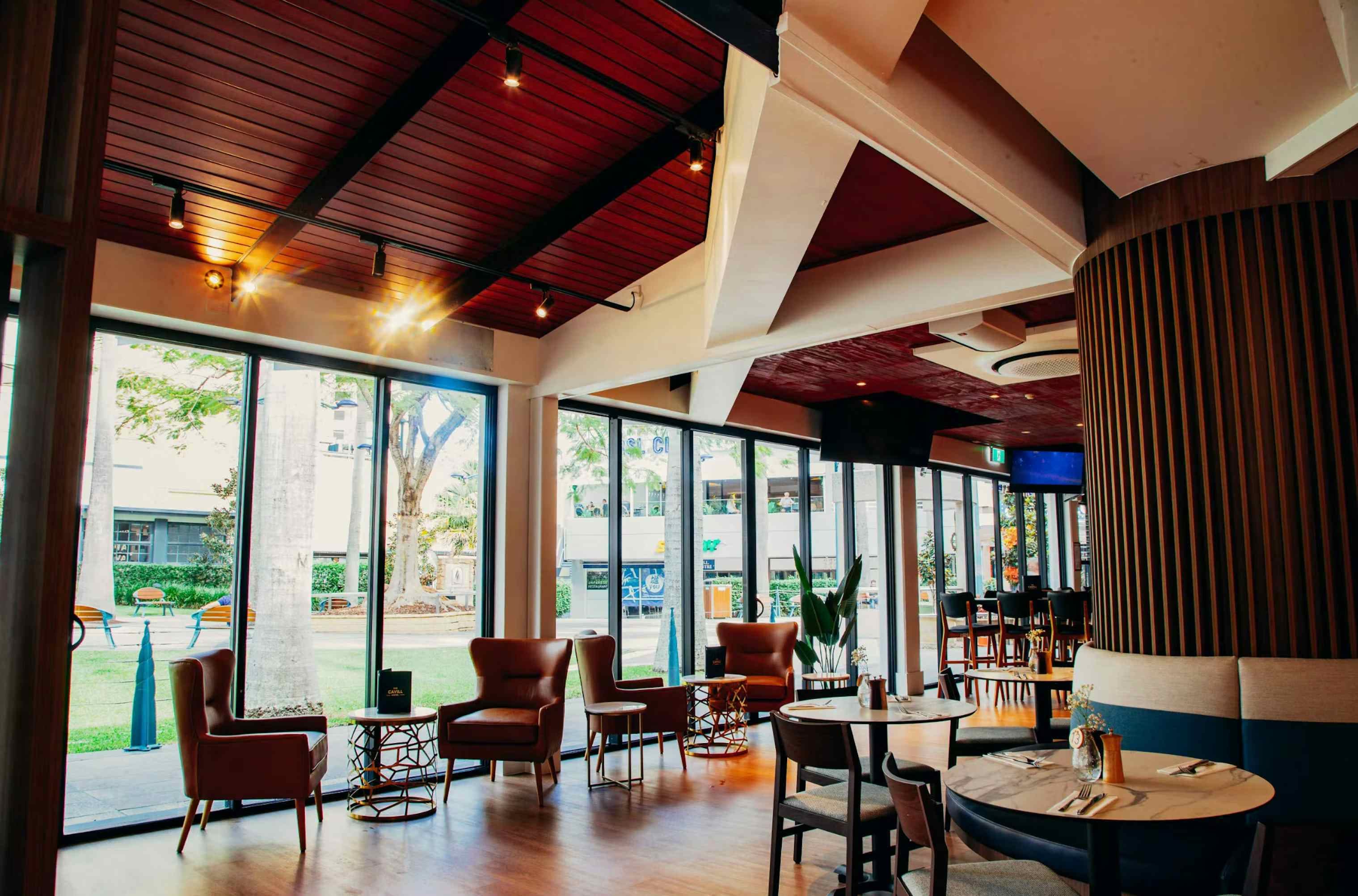 The Cavill Hotel | View of Seating and Floor-to-ceiling Windows | Venue Hire Gold Coast | 1