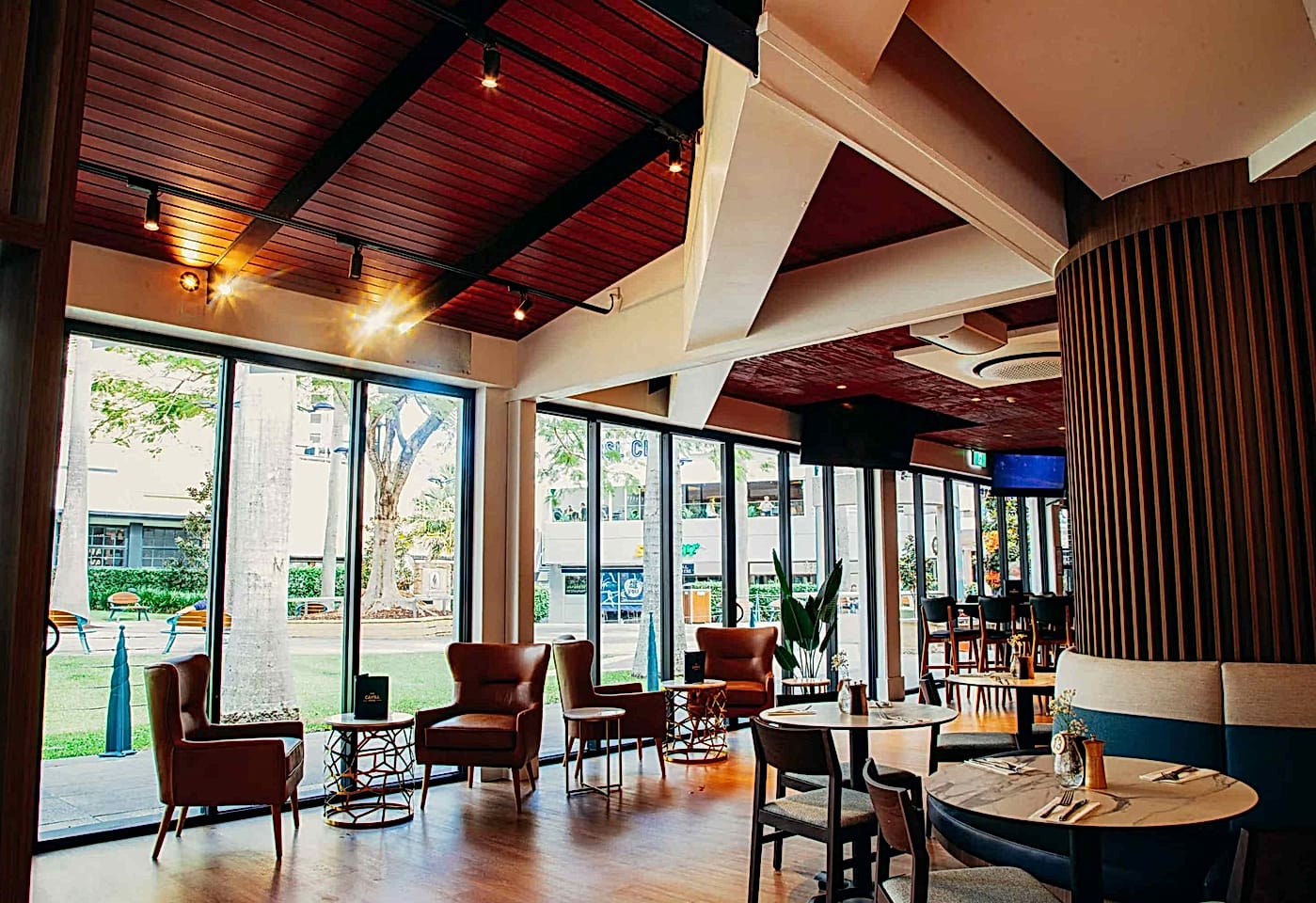 The Cavill Hotel | View of Seating and Floor-to-ceiling Windows | Venue Hire Gold Coast | 1
