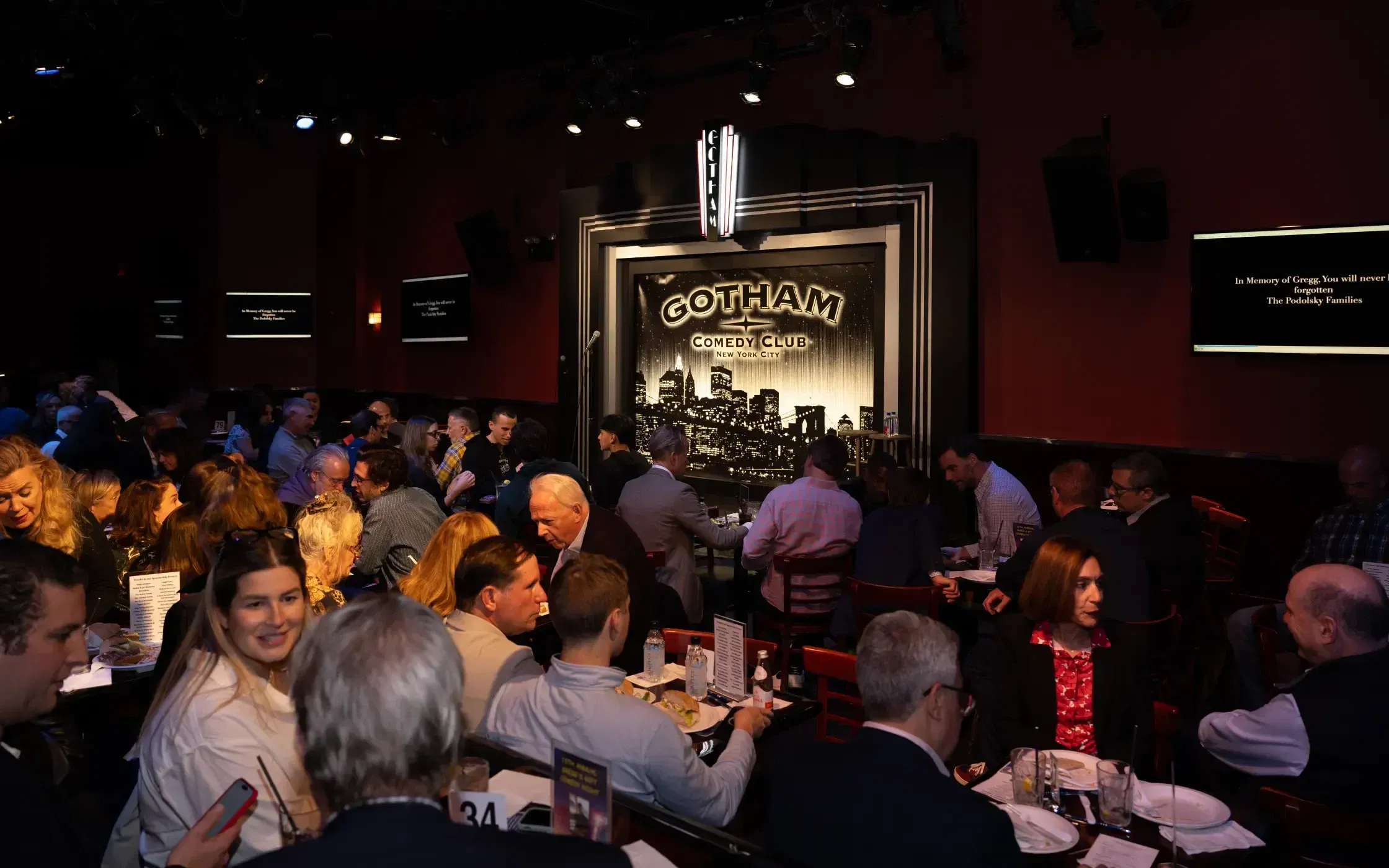 People dining in the main showroom at Gotham, a comedy club in NYC. 