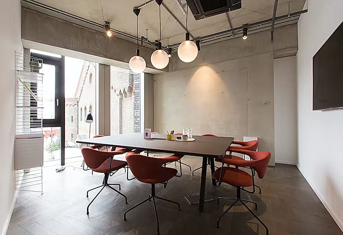 A concrete meeting room in Kings Cross, London