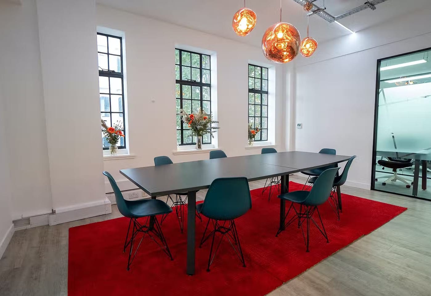 A boardroom-style meeting room