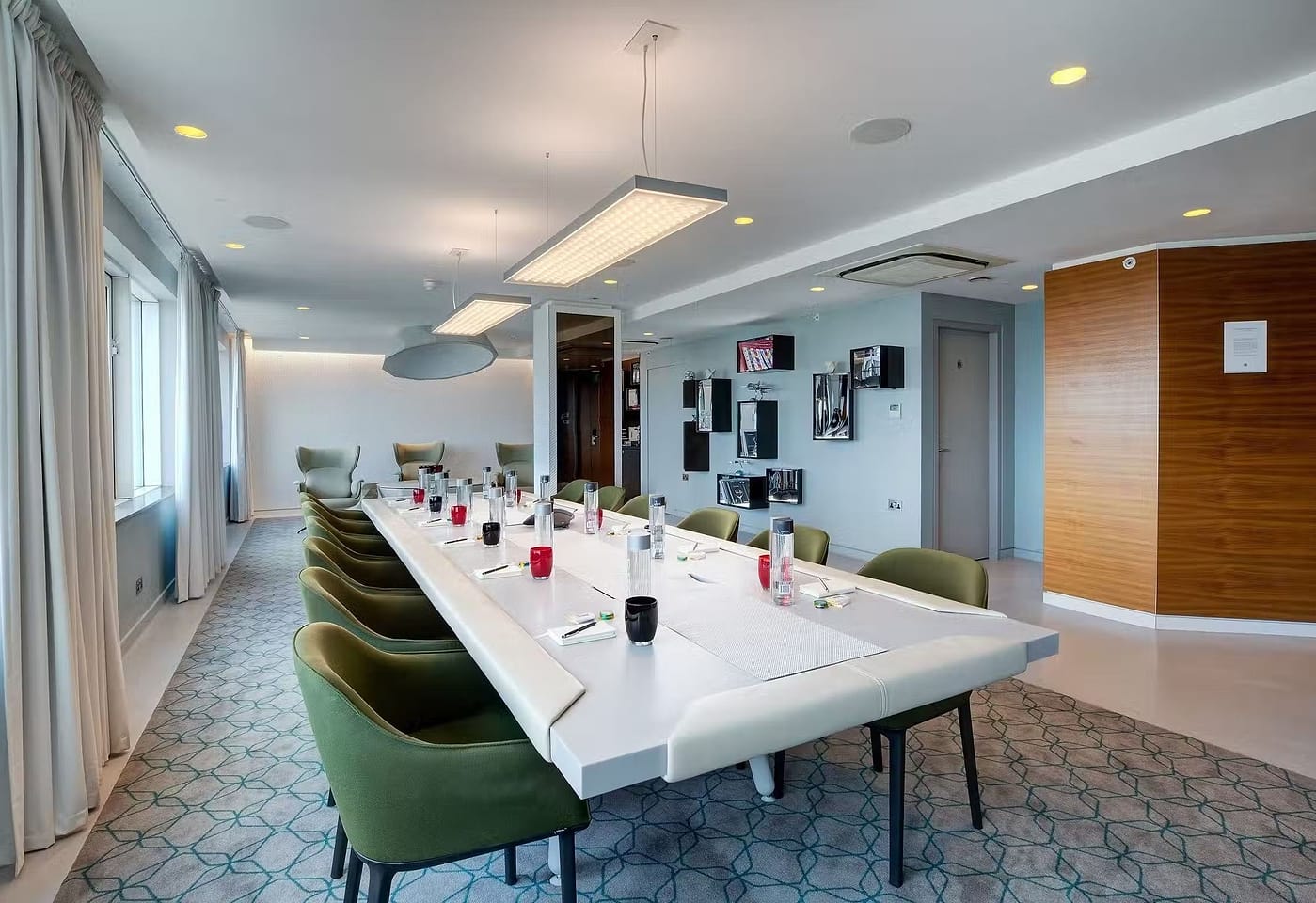 A long table in a meeting room in Kings Cross, London