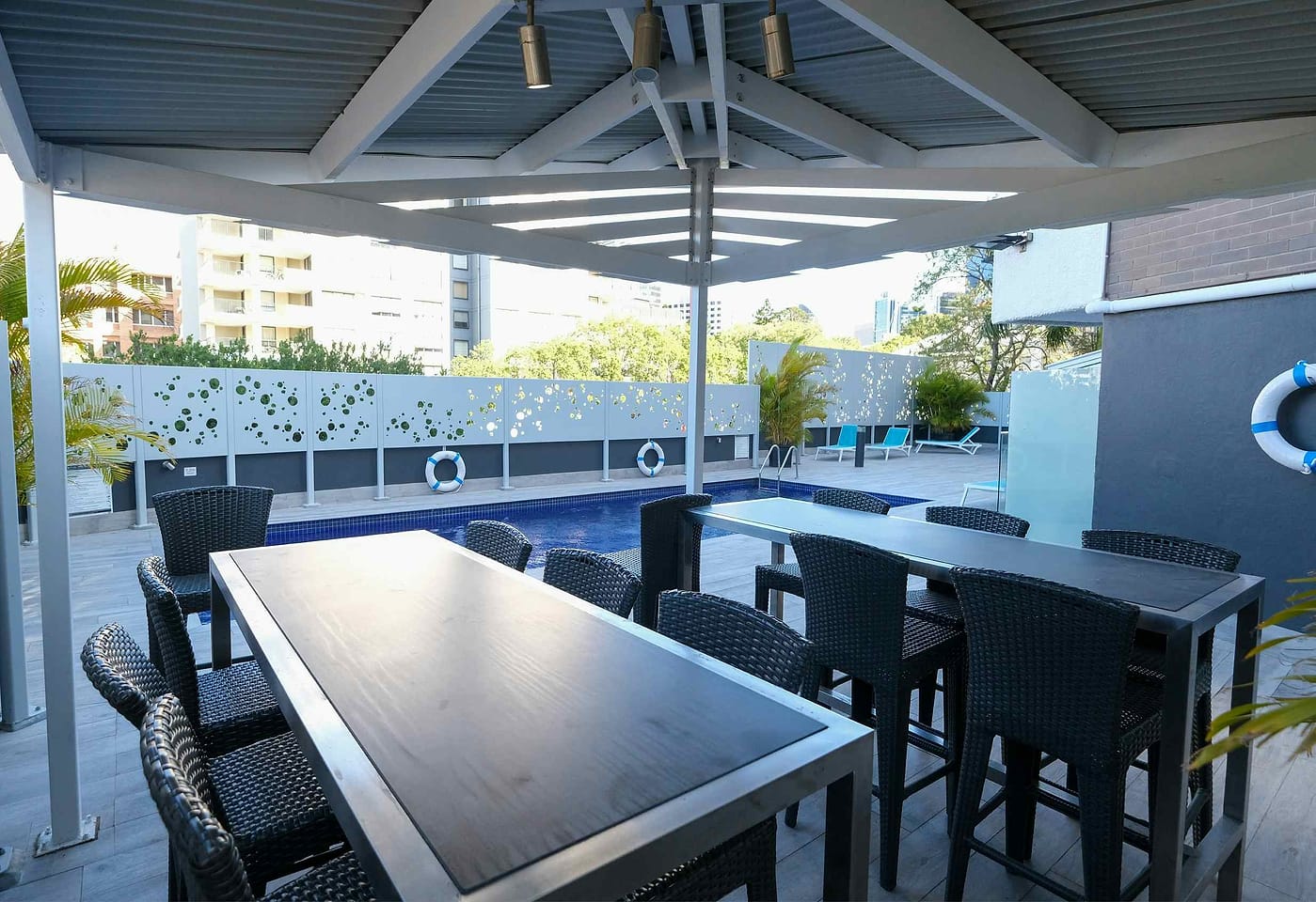 Mercure Brisbane Spring Hill | View of Table Seating Poolside | Venue Hire Brisbane | 1