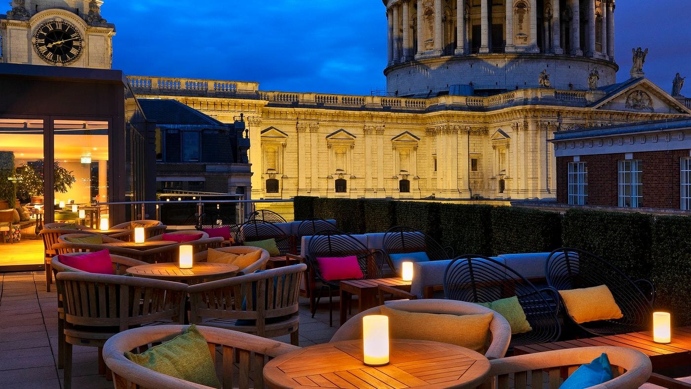 The roof terrace at night at Sabine, a bar overlooking St Pauls Cathedral