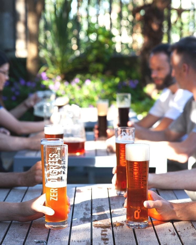 People drinking on the terrace at ZeroDegrees, bristol