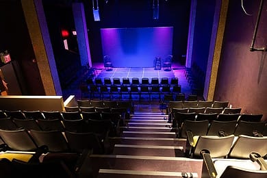 A theater at Asylum NYC, a comedy club in the city.