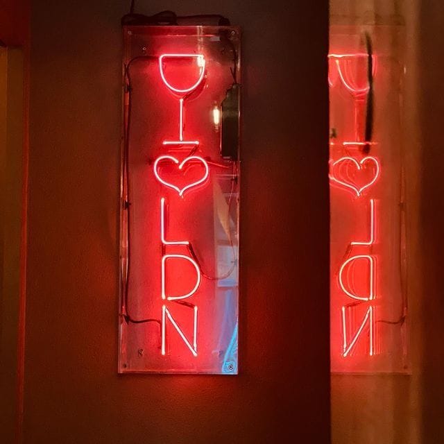 neon sign at dalla terra wine bar seven dials london bar