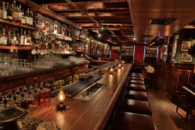 The counter at The Dead Rabbit NYC, a bar for celebrating 21st birthdays in New York. 