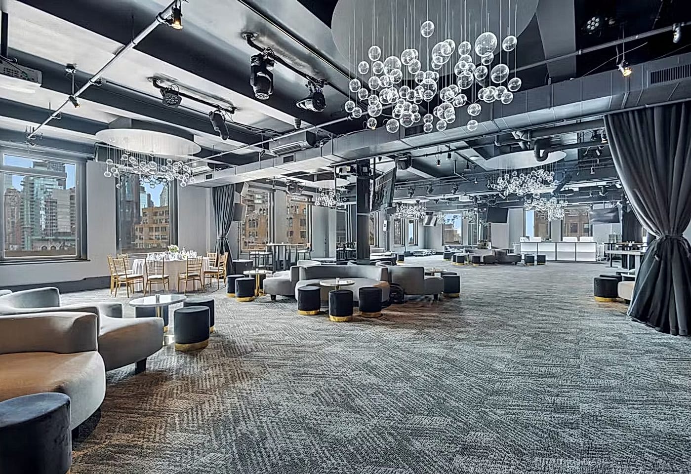 A luxury banquet hall with panoramic views: Empire Penthouse at 230 Fifth 1