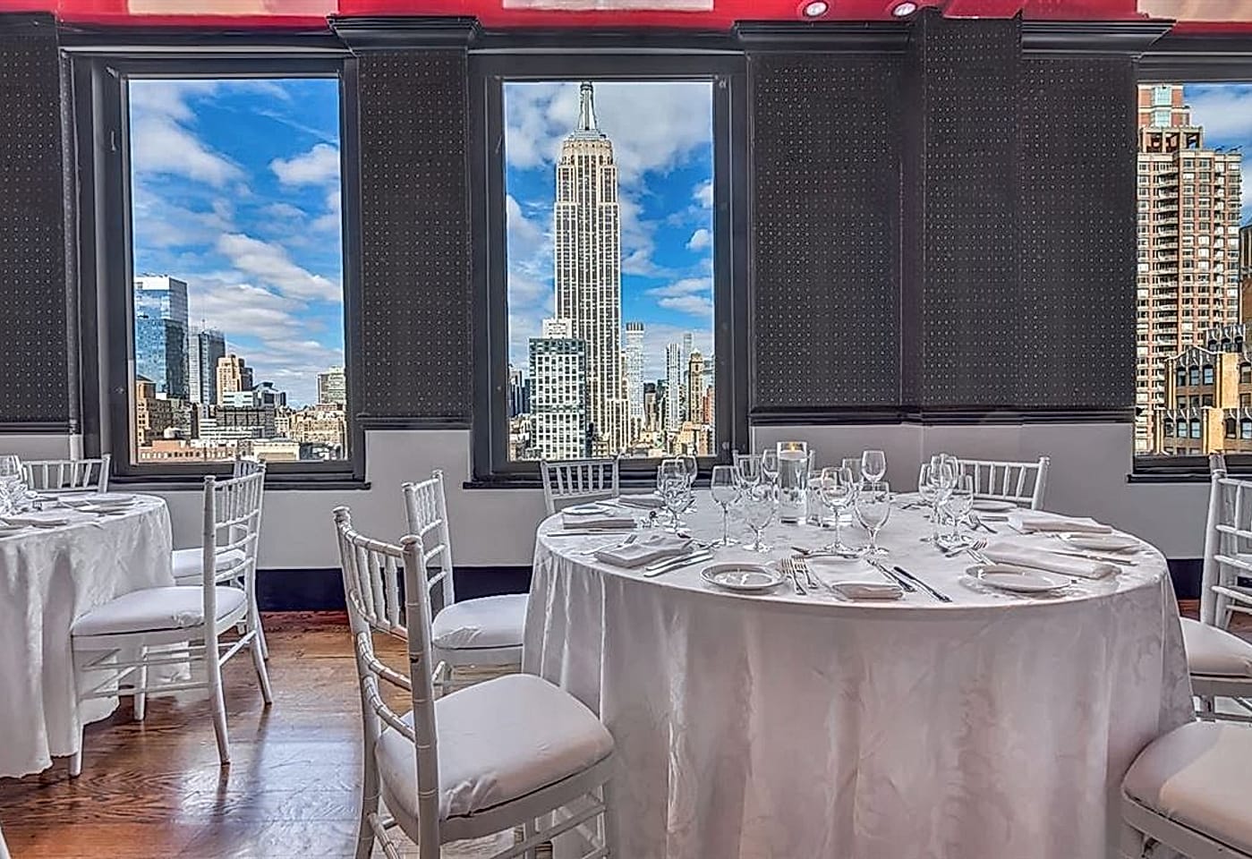 A luxury banquet hall with panoramic views: Empire Penthouse at 230 Fifth image 3