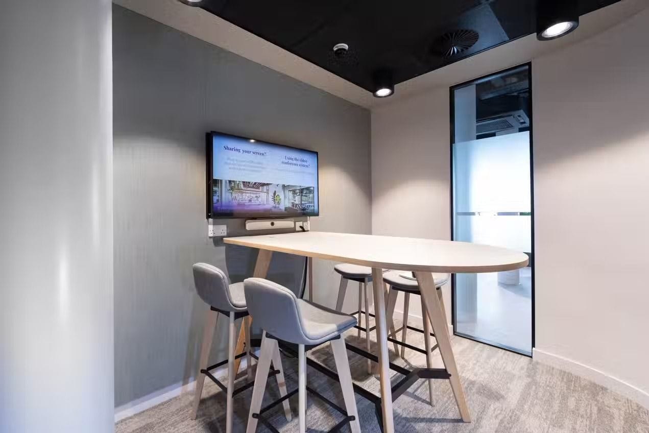 A small meeting room with stools, in Kings Cross, central London