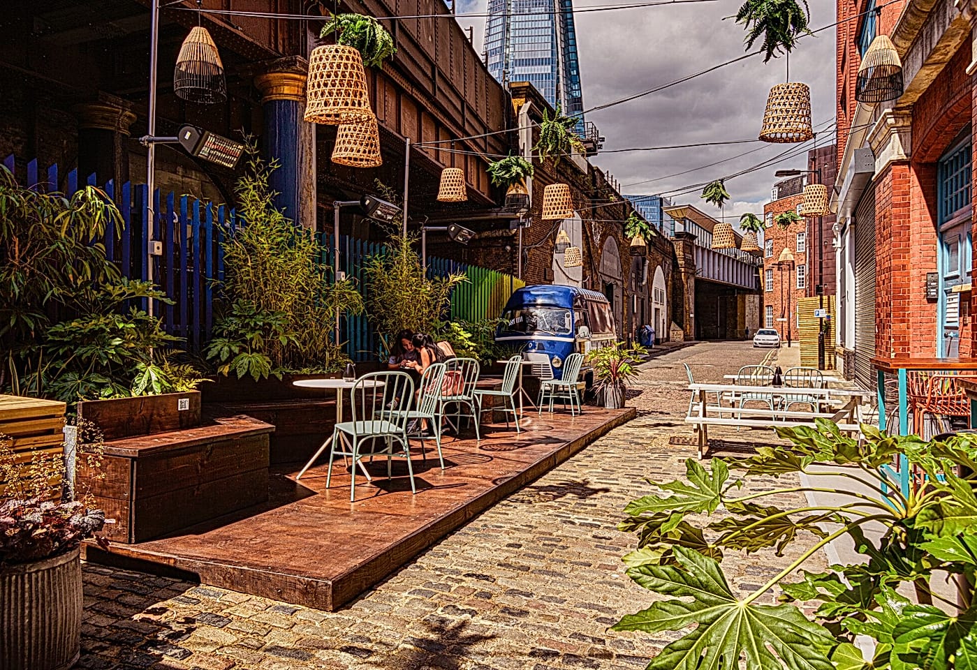 street seating outside nine lives cocktail bar in bermondsey london