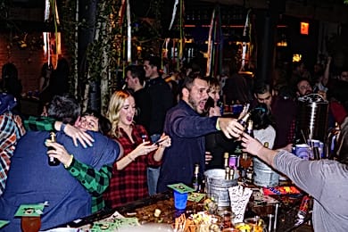 People partying at Porchlight, a bar for celebrating 21st birthdays in New York.