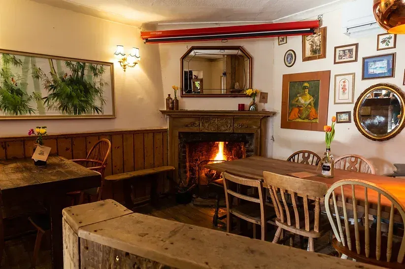 fireplace in the prince arthur pub in old street in london
