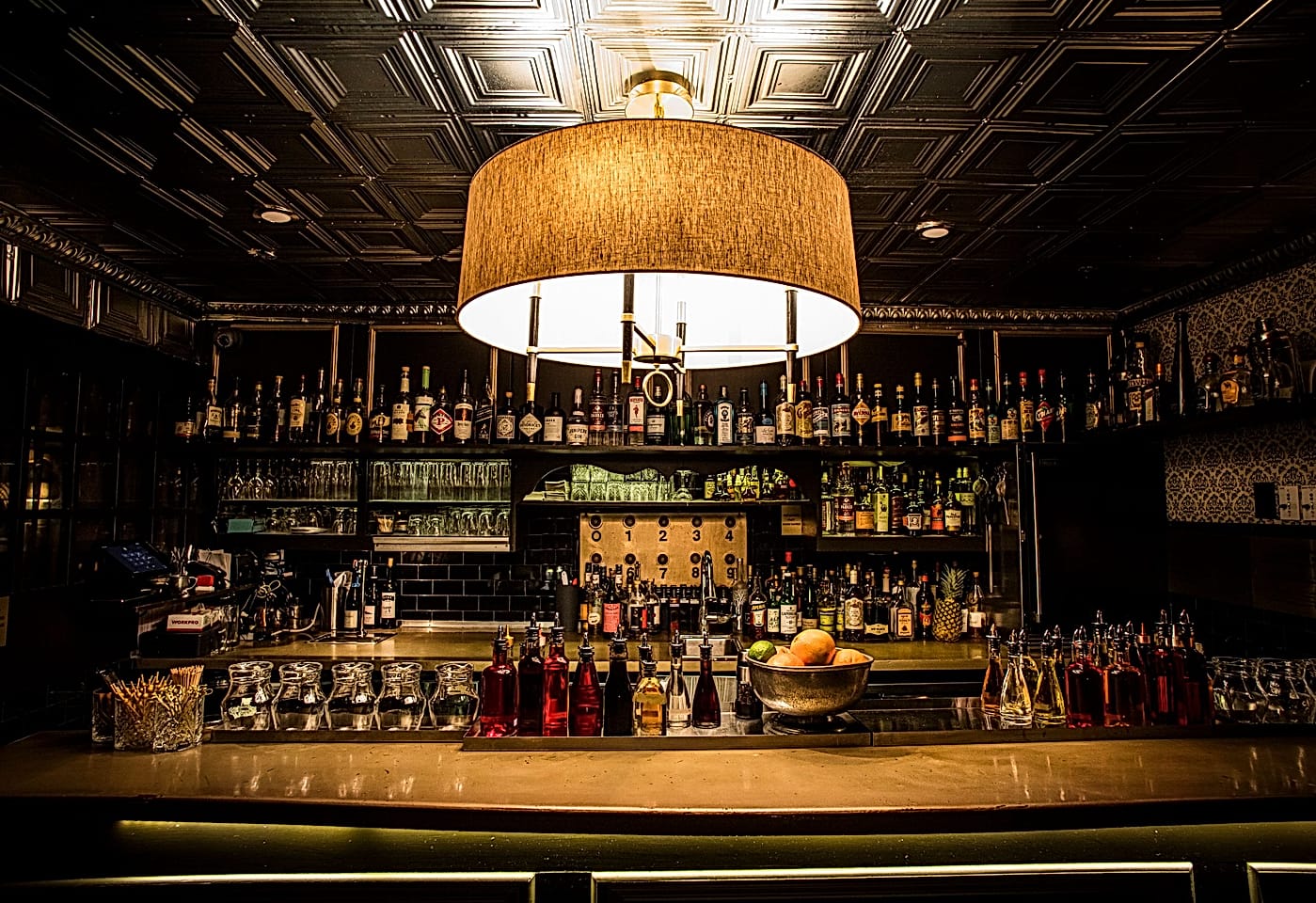 The alcohol selection at The Raines Law Room Chelsea, a bar for celebrating 21st birthdays in New York.