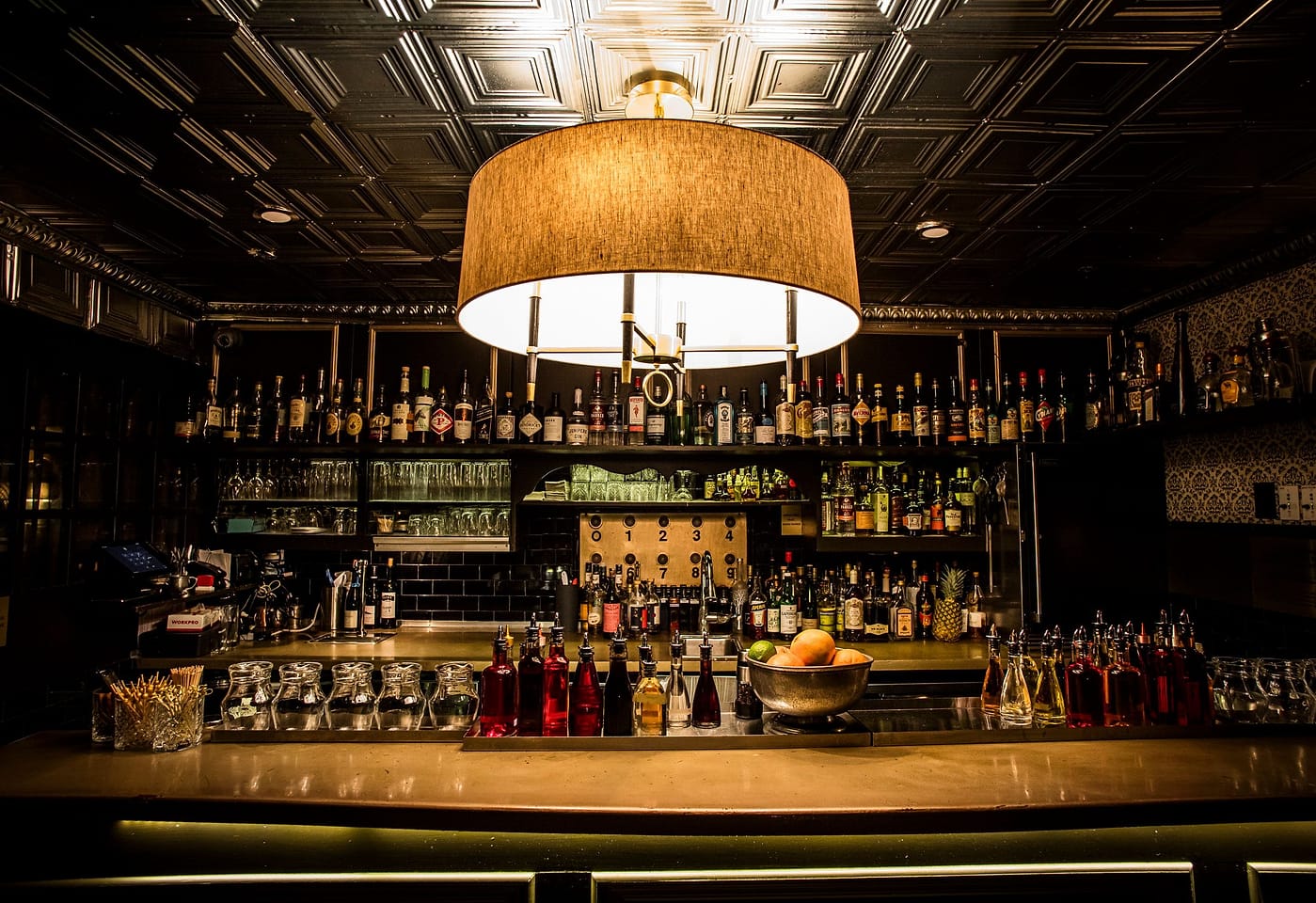 The alcohol selection at The Raines Law Room Chelsea, a bar for celebrating 21st birthdays in New York.