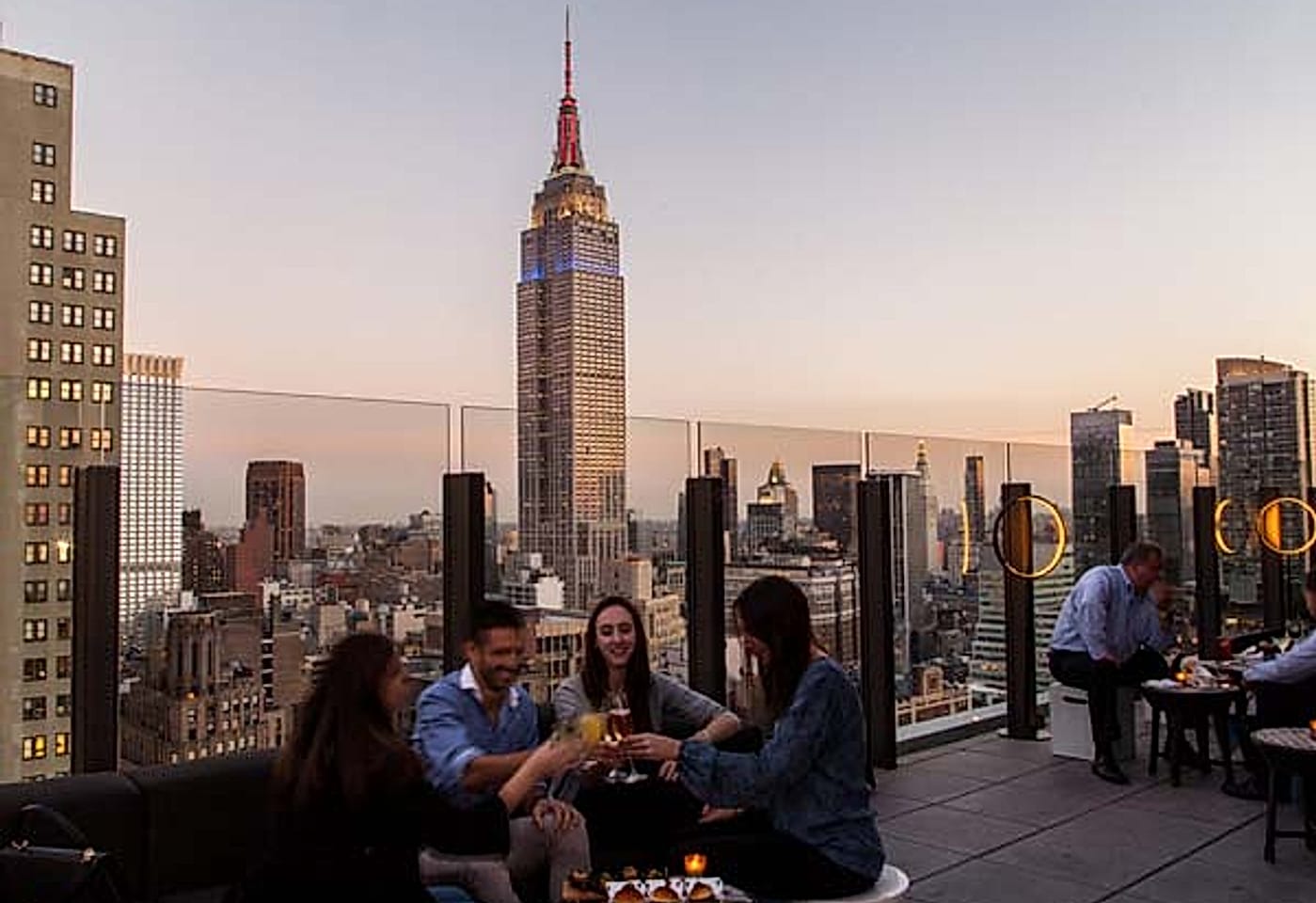 An outdoor terrace with views of the Empire State Building at The Skylark, a bar for celebrating 21st birthdays in New York.