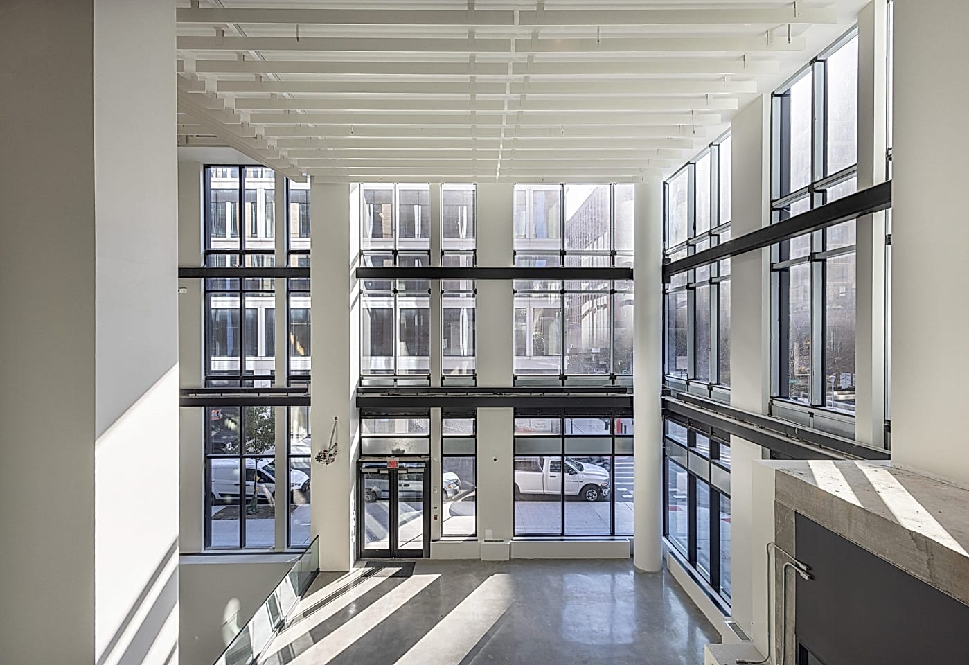 Large windows at Skylight at Essex Crossing, a conference venue on the Lower East Side in NYC.