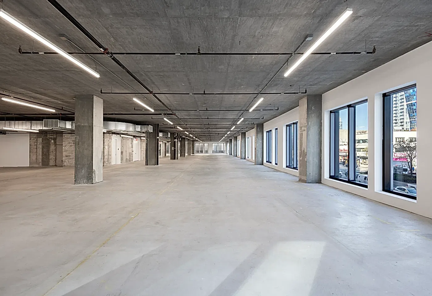 A large open space in Skylight at Essex Crossing, a conference venue on the Lower East Side in NYC.