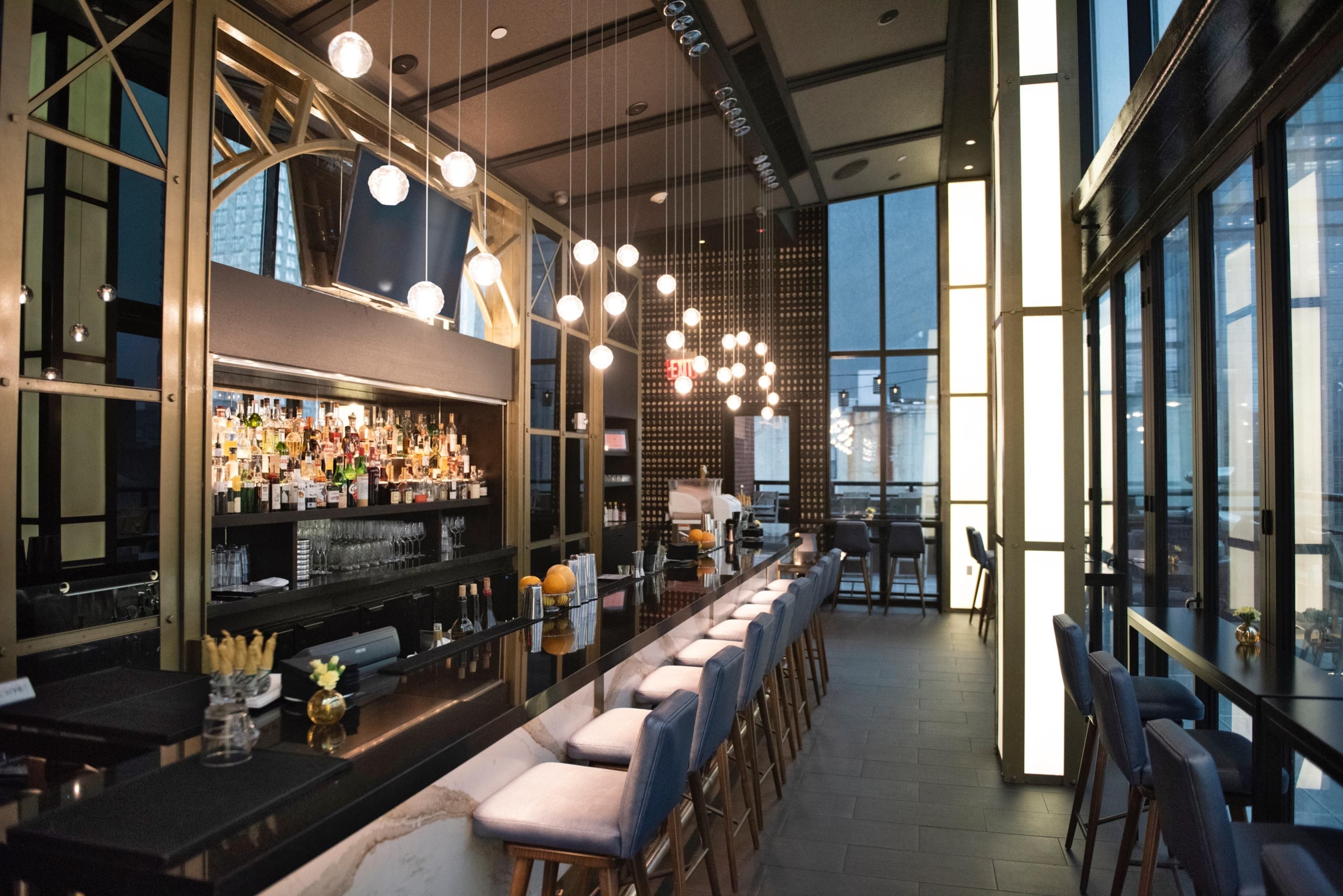 An outdoor bar with vintage elegance: Spyglass Rooftop Bar image 2