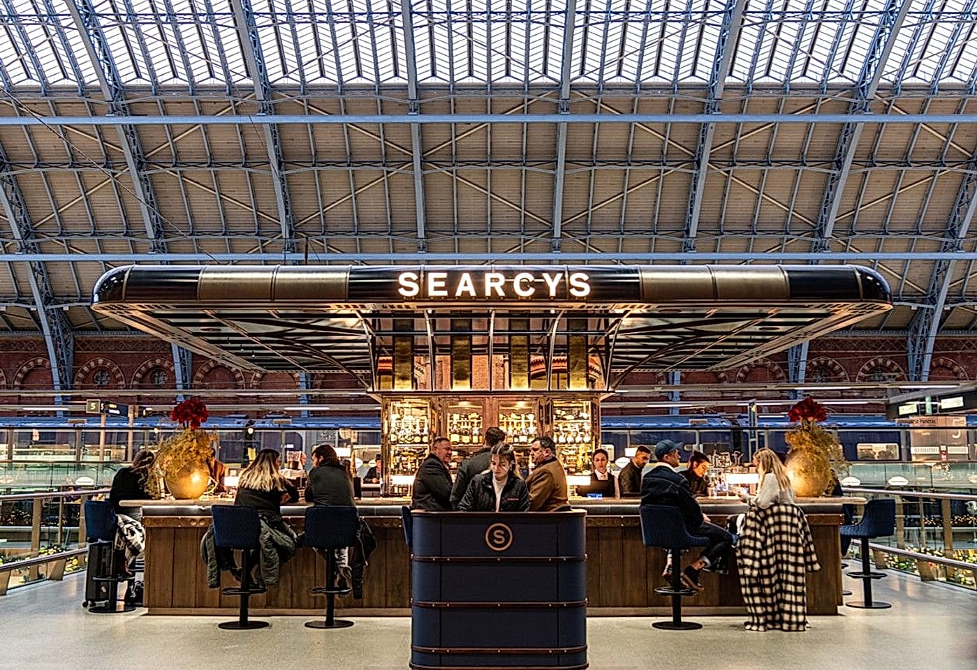 people at st pancras brasserie and champagne bar in kings cross london