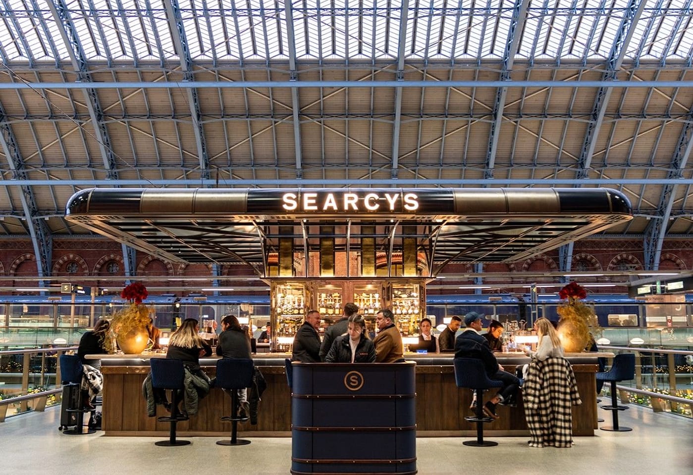 people at st pancras brasserie and champagne bar in kings cross london