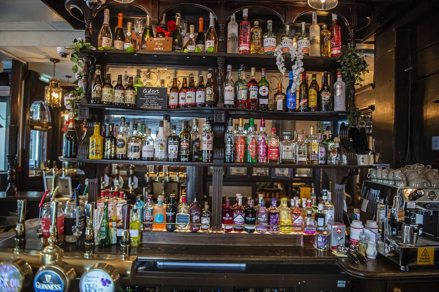 shelves behind the bar at the bunch of grapes in knightsbridge london