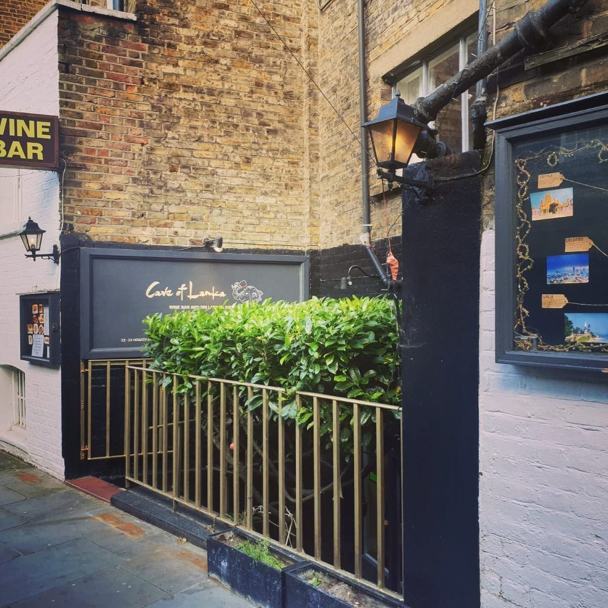 exterior of the cave wine bar and kitchen earls court london bar