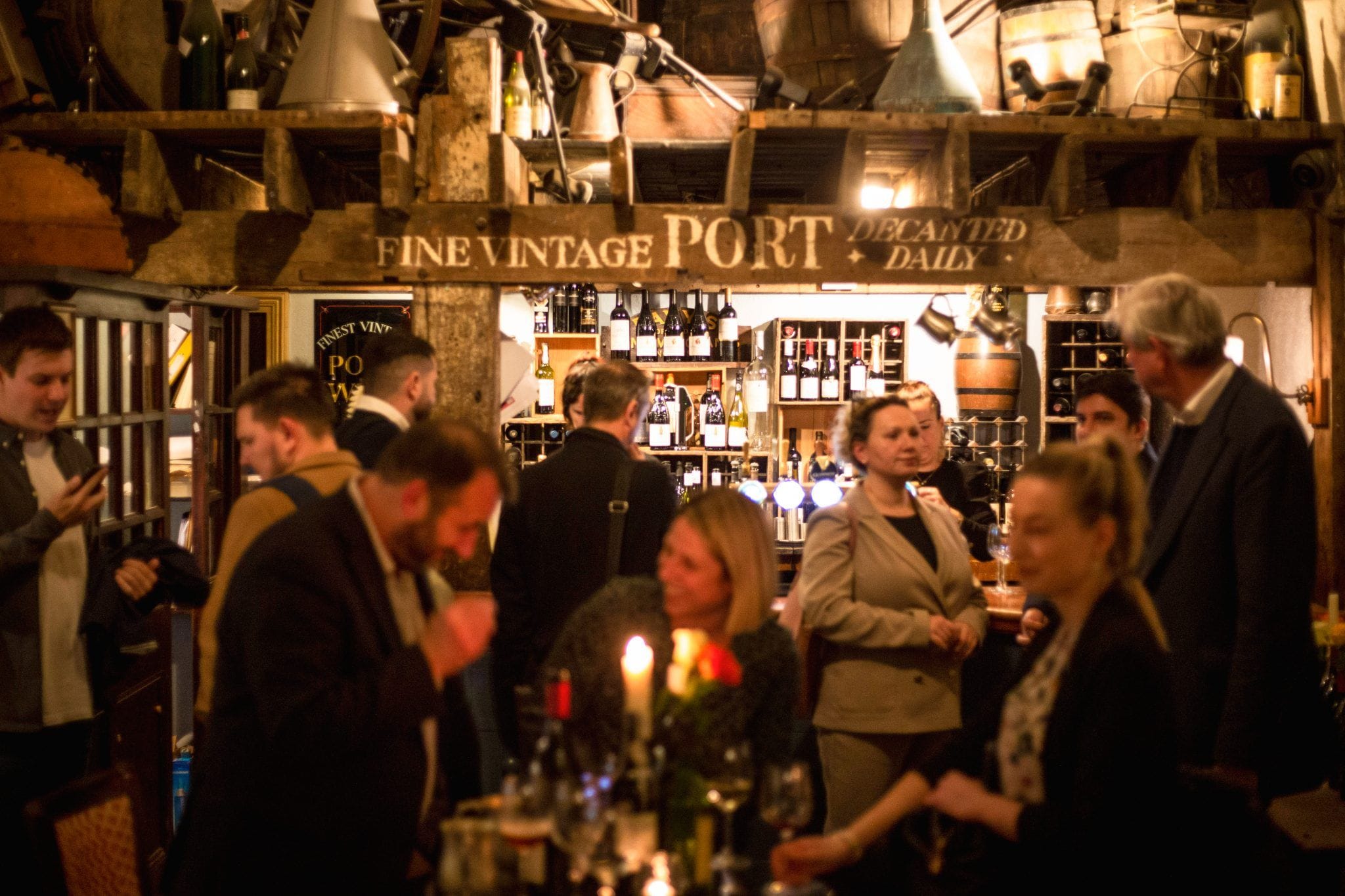 people in the candlelit London Bridge bar the Mug House wine bar