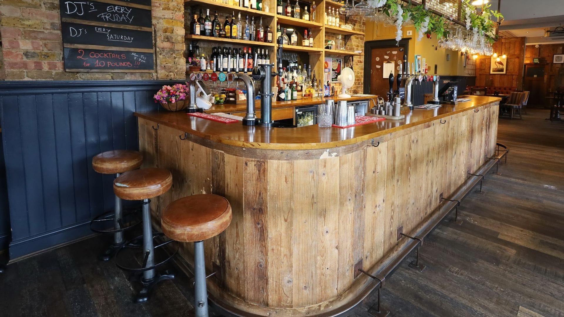 interior of the pocket watch pub in shepherds bush london bar