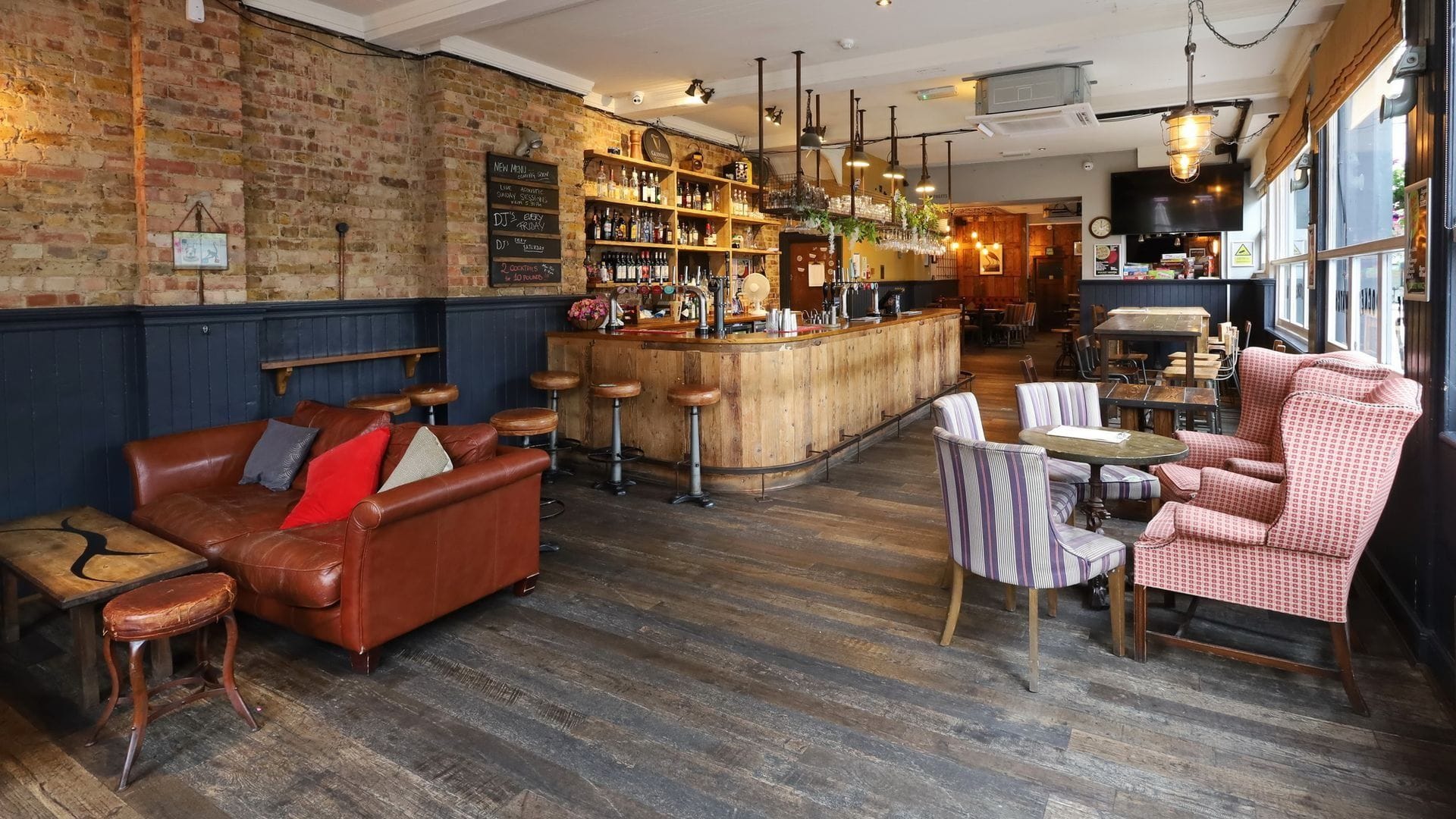 interior of the pocket watch pub in shepherds bush london bar