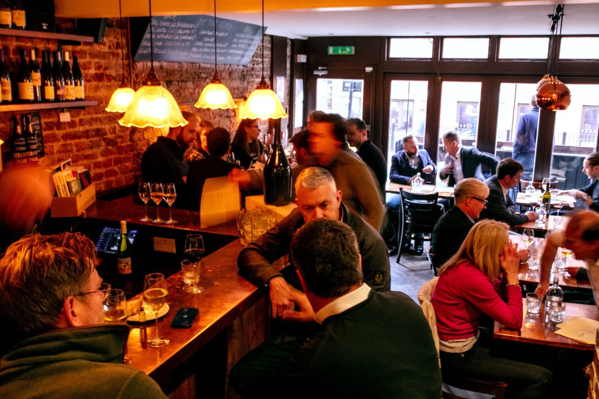 people in the remedy wine bar in fitzrovia london bar