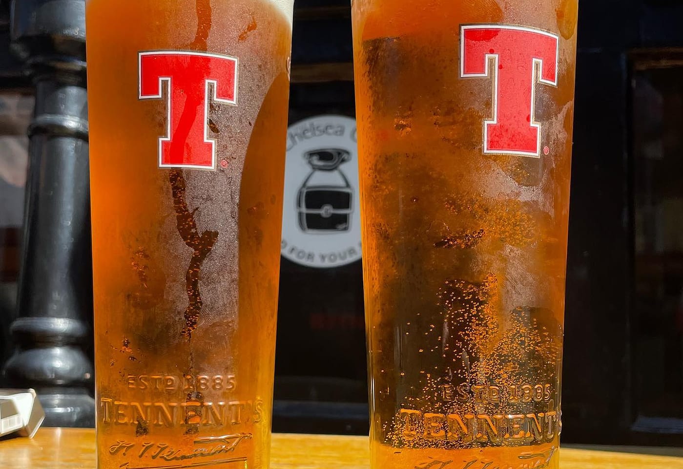 two pints of tennents lager the scottish stores kings cross pub in london