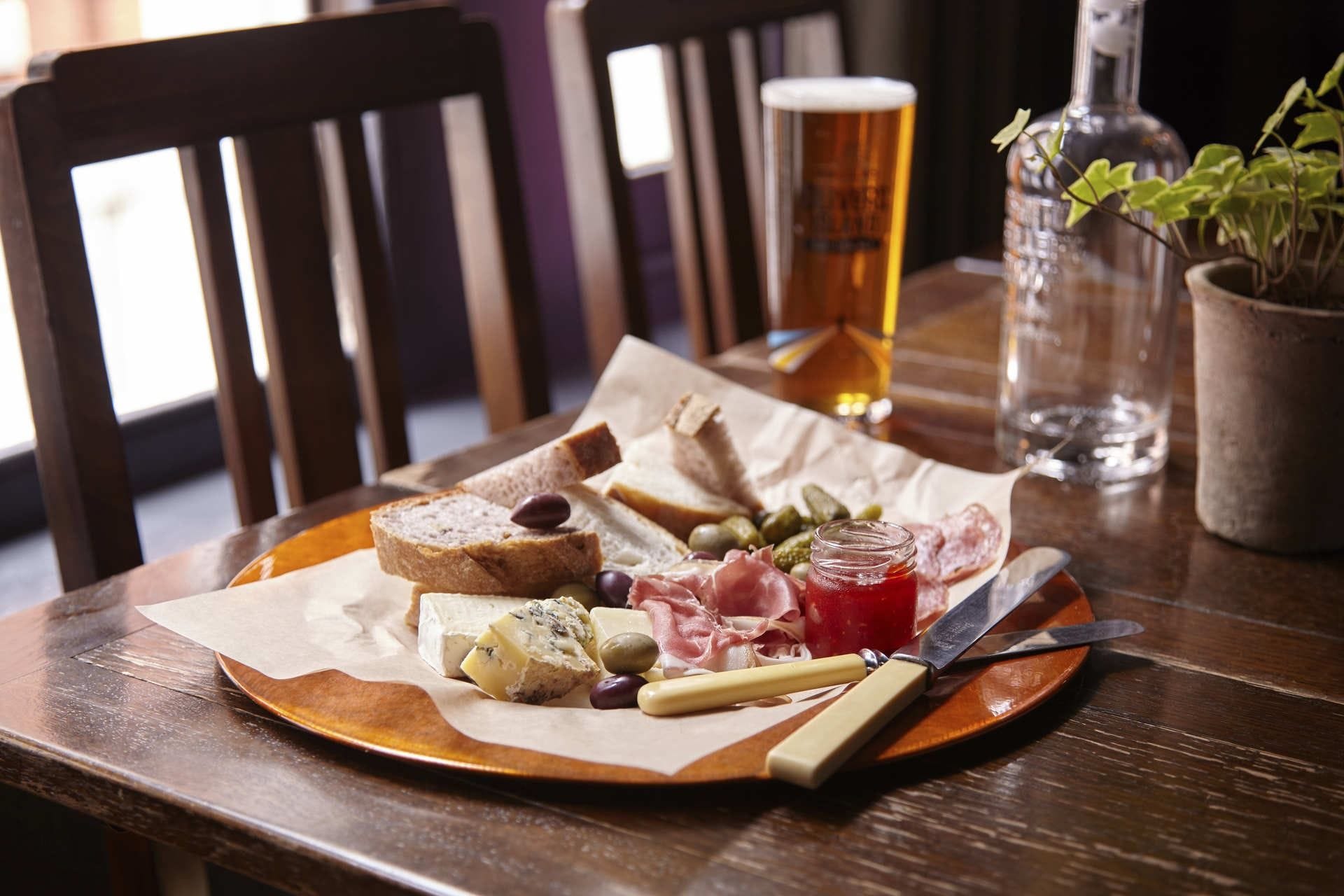 charcuterie and pint at the sutton arms barbican bar london