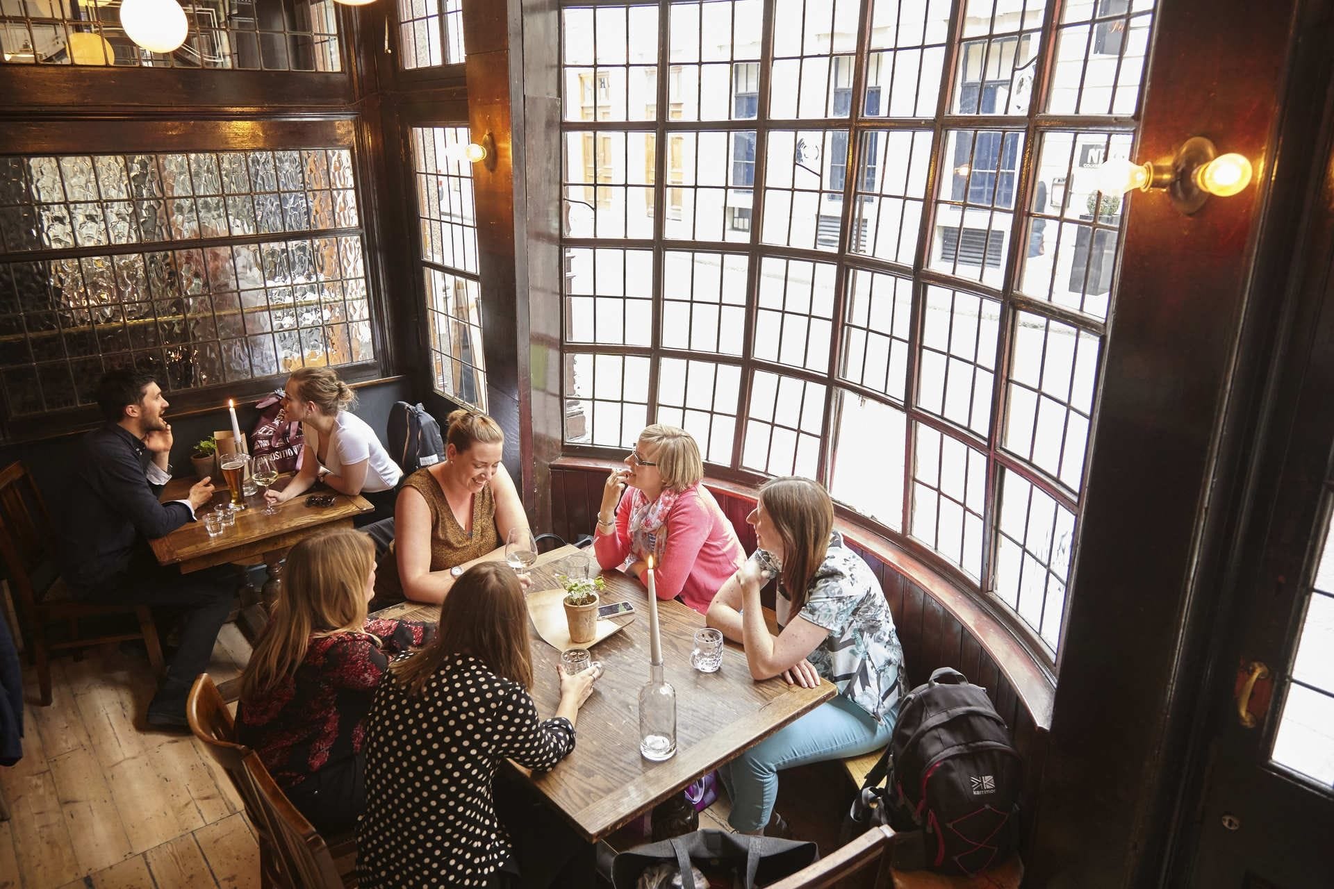 people in the sutton arms barbican bar london