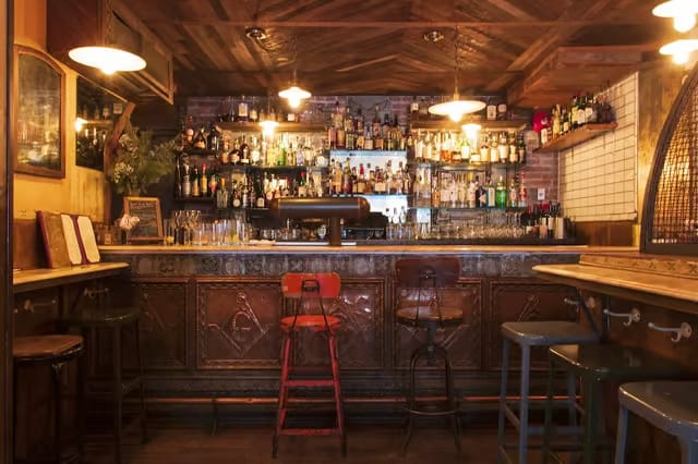 The counter at Tiny & The Bar Upstairs, one of the best bars in Manhattan, NYC.