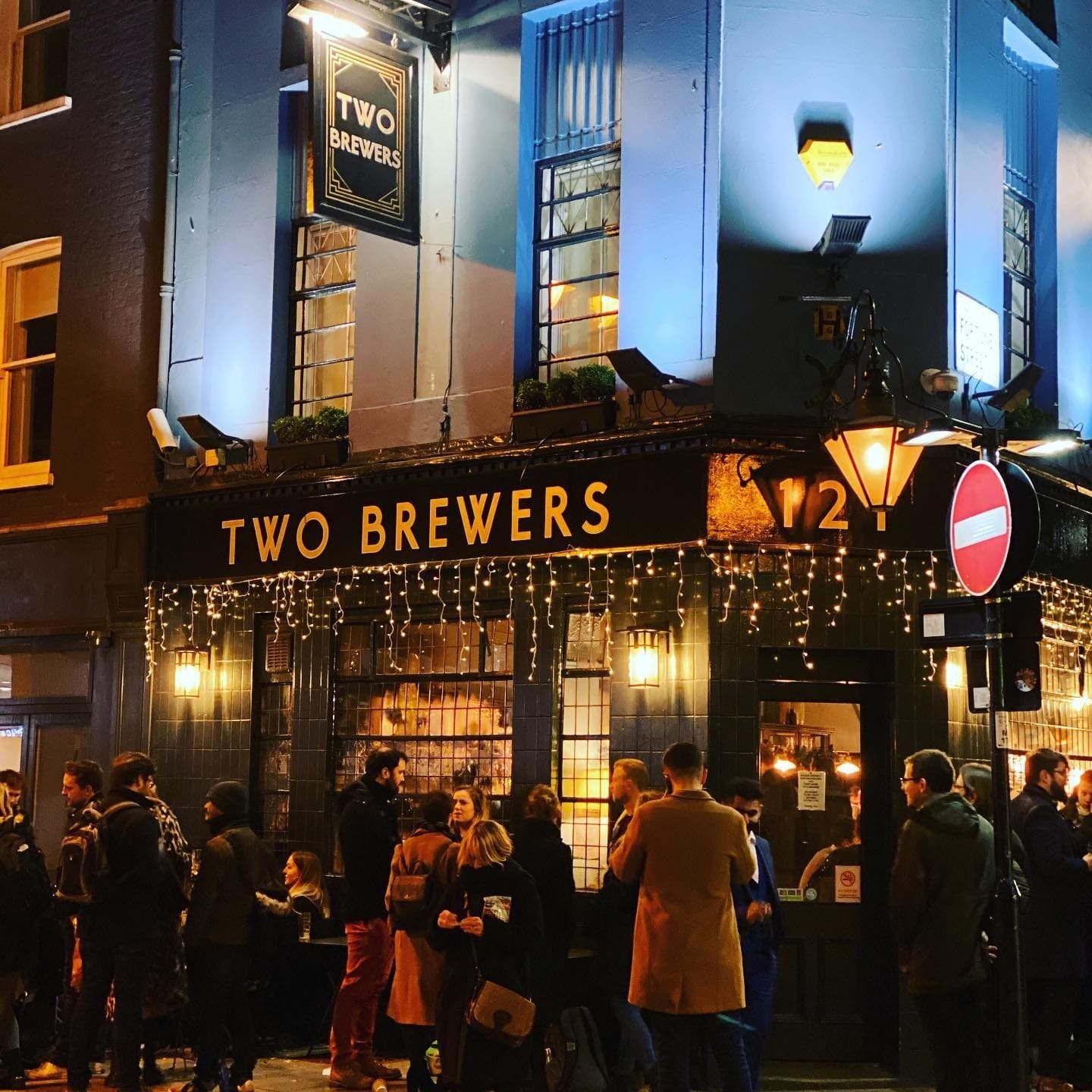 people outside the two brewers barbican bar london